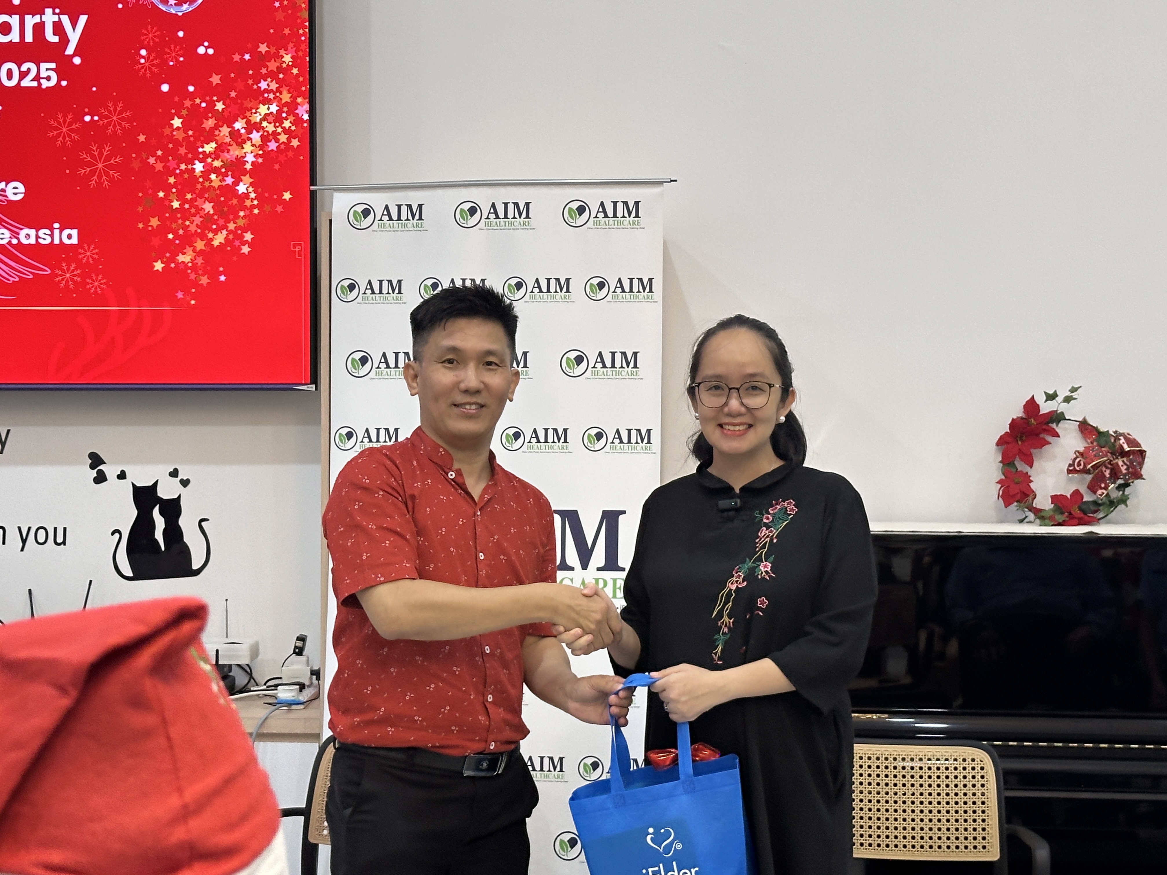 Lucky draw prize presentation at Christmas celebration